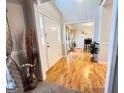 Inviting foyer with hardwood floors and neutral tones at 128 Brookhaven Ln, Mcdonough, GA 30253