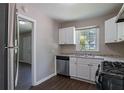 Efficient kitchen equipped with stainless steel appliances, granite countertops, and ample cabinet space at 4684 City View Dr, Forest Park, GA 30297