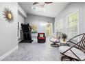 Bright sun room with exercise equipment and comfortable seating at 2069 Willow Chase Ct, Tucker, GA 30084