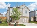 Attractive two-story home with a mixed facade and well-kept lawn at 2764 Aralynn Way, College Park, GA 30337