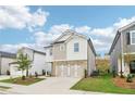 Lovely two-story home showcasing a brick and siding exterior and a convenient two-car garage at 2764 Aralynn Way, College Park, GA 30337