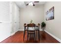 Small dining area with hardwood floors and a view into other areas of the condo at 711 Cosmopolitan Ne Dr # 347, Atlanta, GA 30324