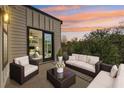 Inviting balcony featuring comfortable seating and serene views, ideal for relaxation and enjoying the outdoors at 1140 Hubbard Sw St, Atlanta, GA 30310