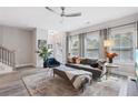 Cozy living room with large windows, modern furnishings, and an open layout at 2424 Lakeshore Se Ln, Atlanta, GA 30316