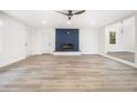 Bright living room boasts hardwood floors, a modern fireplace, and ample natural light at 3185 Hammarskjold Dr, East Point, GA 30344