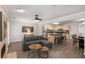 Inviting living space with a large sectional sofa, open to the kitchen and dining area, perfect for entertaining and relaxation at 3795 Soapstone Rd, Decatur, GA 30034