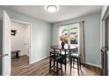 Cozy breakfast nook featuring hardwood floors and backyard views at 3228 Clairmont North Ne # 3228-A, Brookhaven, GA 30329