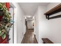 Inviting hallway with hardwood floors and convenient coat rack at 3228 Clairmont North Ne # 3228-A, Brookhaven, GA 30329