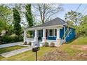 Attractive single-story home with a covered porch and freshly landscaped yard at 531 Roy Sw St, Atlanta, GA 30310