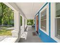 Inviting covered porch with classic columns, ideal for relaxing and enjoying the outdoors at 531 Roy Sw St, Atlanta, GA 30310