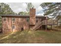 A well-maintained backyard with a wooden deck, perfect for outdoor relaxation at 4020 Cranwood Dr, Atlanta, GA 30349