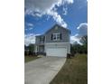 Two-story home with a well-maintained lawn and spacious two-car garage at 87 Sonoma Drive, Dallas, GA 30157