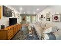 Bright and spacious living room with a large sectional and stylish decor at 298 Birch St, Atlanta, GA 30354
