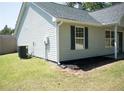 Home exterior with dark window shutters and a well-maintained lawn at 6737 Mason Creek Rd, Douglasville, GA 30135
