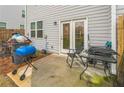 Outdoor patio area with furniture, a grill, and a view of the backyard at 3541 Condor Ct, Atlanta, GA 30331