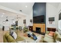 Bright, modern living space with high ceilings, updated fireplace, open floor plan, and stylish decor at 878 Dill Sw Ave, Atlanta, GA 30310