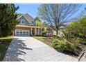 Charming two-story home with stone and siding, featuring a two-car garage, and a meticulously landscaped front yard at 1159 Thornwell Ne Dr, Brookhaven, GA 30319