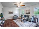Comfortable living room features hardwood floors, a neutral color palette, and stylish decor, creating a relaxing atmosphere at 80 E Howard St, Kingston, GA 30145