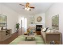 Inviting living room features a fireplace, hardwood floors, and stylish decor at 2361 Maplewood Ct # 25, Atlanta, GA 30339