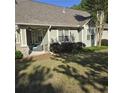 Inviting backyard space, featuring a covered patio and well maintained yard at 278 Mission Oak Se Dr, Grayson, GA 30017