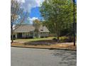 Cozy home with well-maintained lawn, mature trees, and inviting curb appeal at 278 Mission Oak Se Dr, Grayson, GA 30017