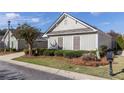Charming one story home with well manicured front yard and mature landscaping at 307 Jessica Way, Canton, GA 30114
