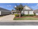 Charming one story home with manicured front yard and concrete driveway at 307 Jessica Way, Canton, GA 30114