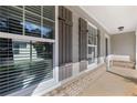 Charming front porch with decorative shutters and brick accents at 307 Jessica Way, Canton, GA 30114