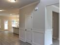 Open-concept kitchen with stainless steel appliances, granite countertops, and hardwood floors at 80 Hawthorn Ln, Covington, GA 30014