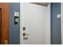 Hallway showing apartment number and doorbell outside of a unit door at 20 Marietta St # 4B, Atlanta, GA 30303