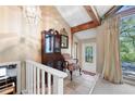 Bright foyer featuring tile floor, high ceiling, and decorative mirror and seating at 3727 Cline Se Dr, Smyrna, GA 30082