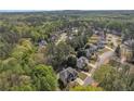Aerial view of the neighborhood surrounded by lush greenery, highlighting its serene and residential setting at 1812 Mountain Lake Nw Dr, Kennesaw, GA 30152