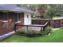 This home features a wood deck and fenced yard that create a private outdoor space at 223 Lucerne St, Decatur, GA 30030