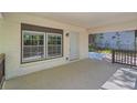 Covered porch featuring white painted brick and access to the home's entrance at 1679 Hollyhock Ter, Decatur, GA 30032