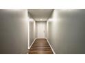 Inviting entryway with wood-look flooring and neutral wall paint at 5169 Hanover St, Atlanta, GA 30349