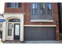 Two-story home with a convenient two-car garage and a classic brick exterior at 600 Broadview Ne Ter, Atlanta, GA 30324