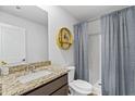 Modern bathroom featuring granite countertops, a shower with curtain and stylish decor at 734 Great Oak Pl, Villa Rica, GA 30180