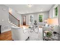 Bright living room with hardwood floors, modern furnishings, and plenty of natural light at 106 Hogue St, Atlanta, GA 30312