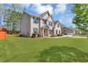 Well-maintained home exterior with a large green lawn at 2603 Dayview Ln, Atlanta, GA 30331