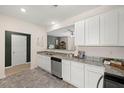 Bright kitchen featuring granite countertops, stainless steel appliances, and ample cabinet space at 4277 Arcadia Dr, Decatur, GA 30034