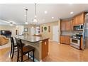 Spacious kitchen featuring a large island, stainless steel appliances, and hardwood flooring at 150 Fitzroy Ln, Acworth, GA 30101