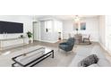 A stylishly furnished living room with seating and dining area at 725 Dalrymple Rd # 3G, Atlanta, GA 30328