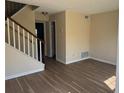 Bright living room showcasing modern flooring and a staircase, perfect for entertaining at 501 Carlton Rd # 5E, Palmetto, GA 30268