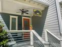 Charming home exterior featuring a covered porch with a ceiling fan at 1100 Wylie Se St # A, Atlanta, GA 30316