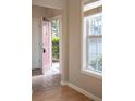 Welcoming entryway with natural light and tile flooring at 101 Spring Heights Se Ln # 1, Smyrna, GA 30080
