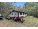 This home offers outdoor space perfect for projects and recreation at 1302 Brittain Rd, Douglasville, GA 30134