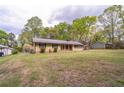 A single-story home with a well-maintained lawn and convenient carport at 284 Zion Wood Rd, Loganville, GA 30052