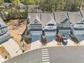 A neighborhood with well-maintained homes, orderly streetscapes, and mature trees, offering a blend of comfort and community at 1041 Cherryfield Run, Marietta, GA 30008