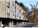 Multi-story condo building featuring a modern design and convenient garage parking at 35 Moda Ln, Atlanta, GA 30316