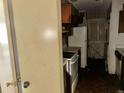 A small outdated kitchen with linoleum flooring and white appliances at 3038 Parc Lorraine, Lithonia, GA 30038